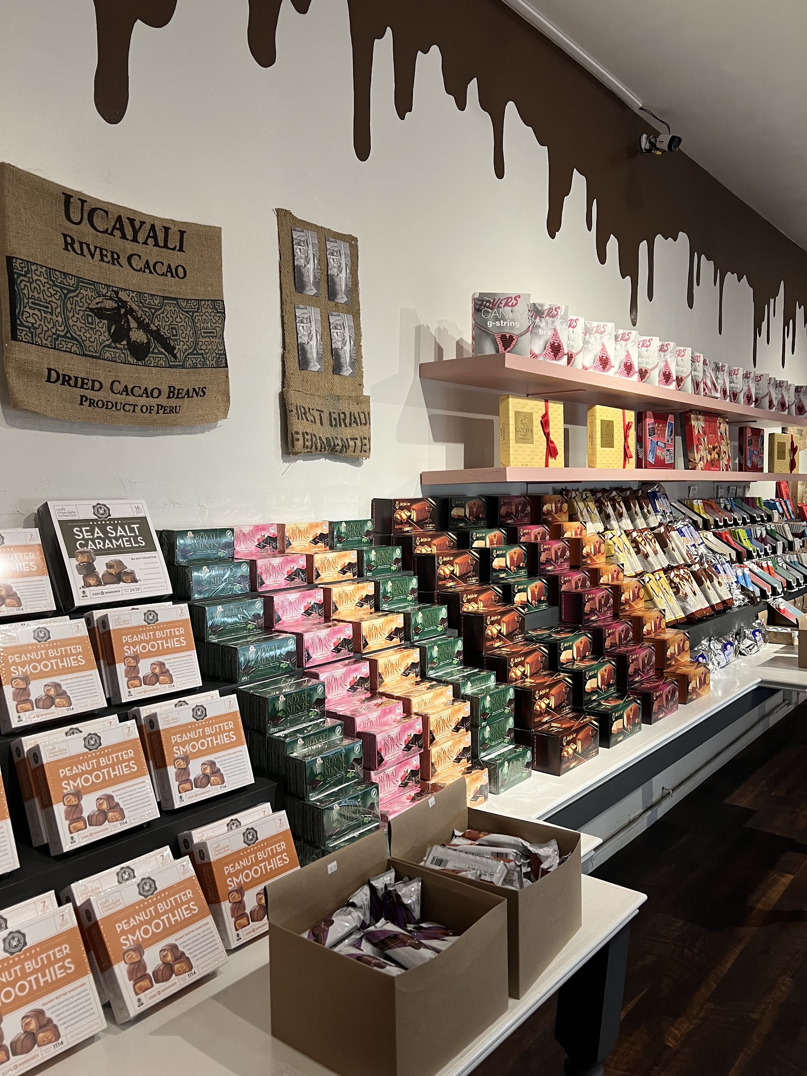 Chocolate-themed shelving and gift display inside the store